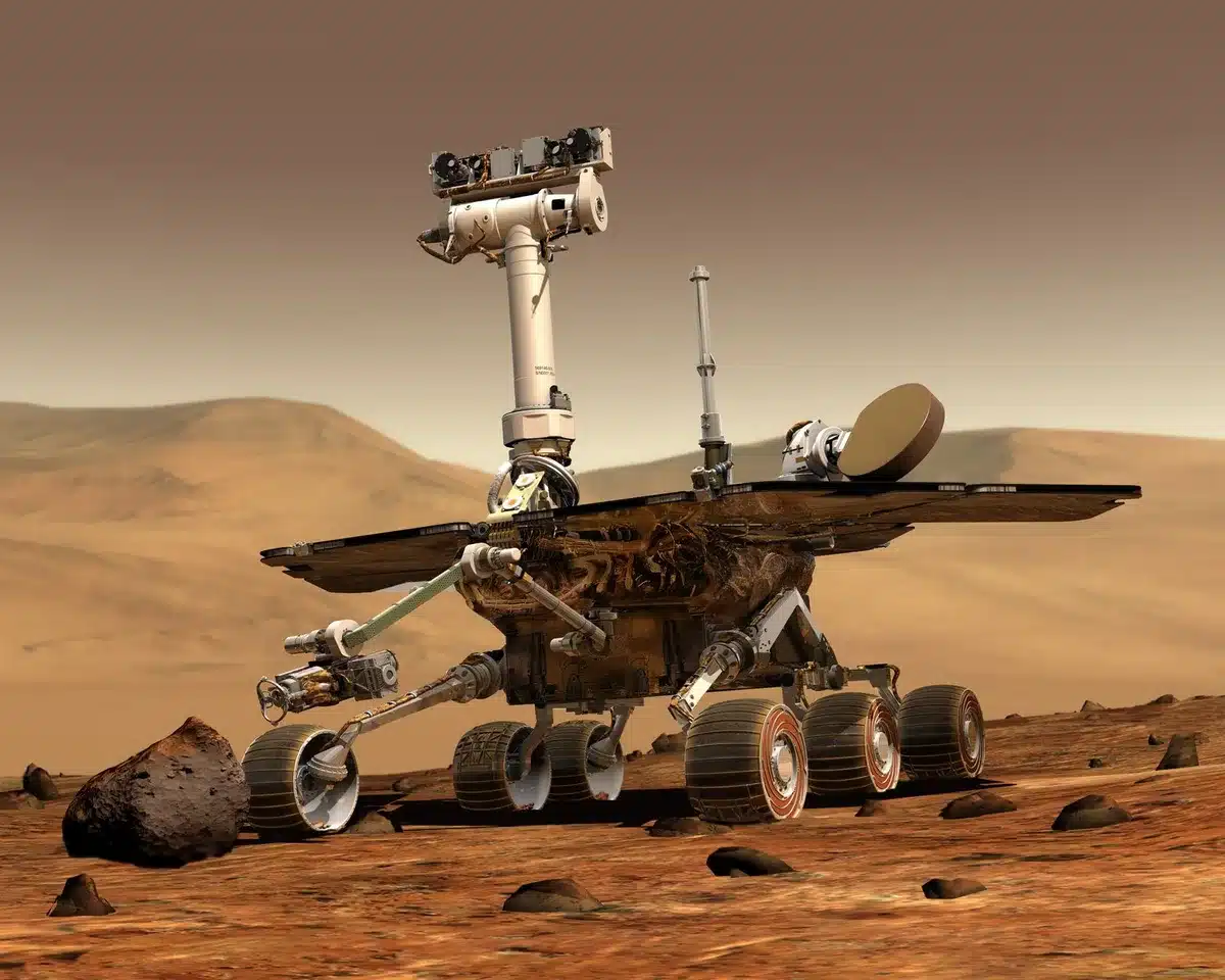 Lander robotico e rover autonomo sulla superficie lunare durante una missione di consegna di carichi